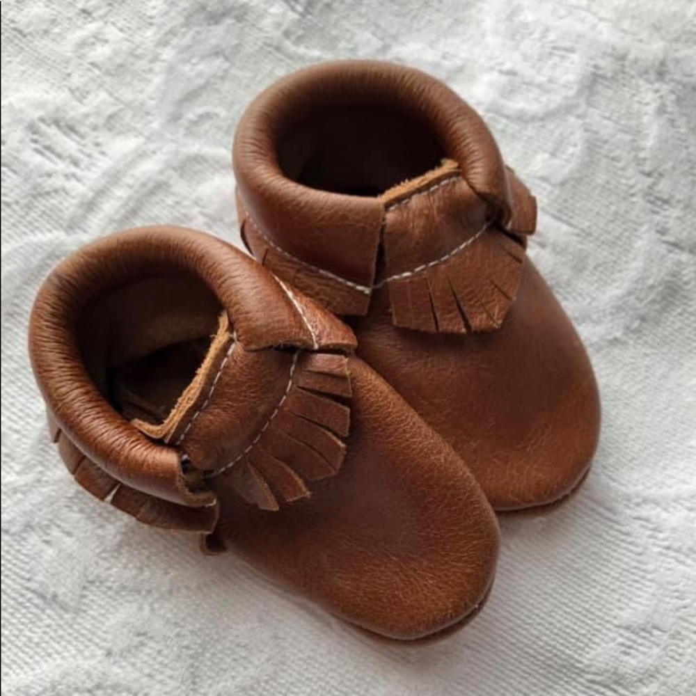 Hello Moccs baby moccasins. Never worn.